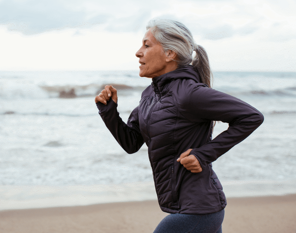 healthy older woman running after being tested by a blood test company